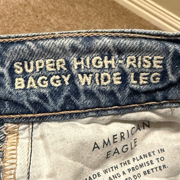 Women’s American Eagle Outfitters Distressed Blue Flare Jeans - Picture 8 of 8